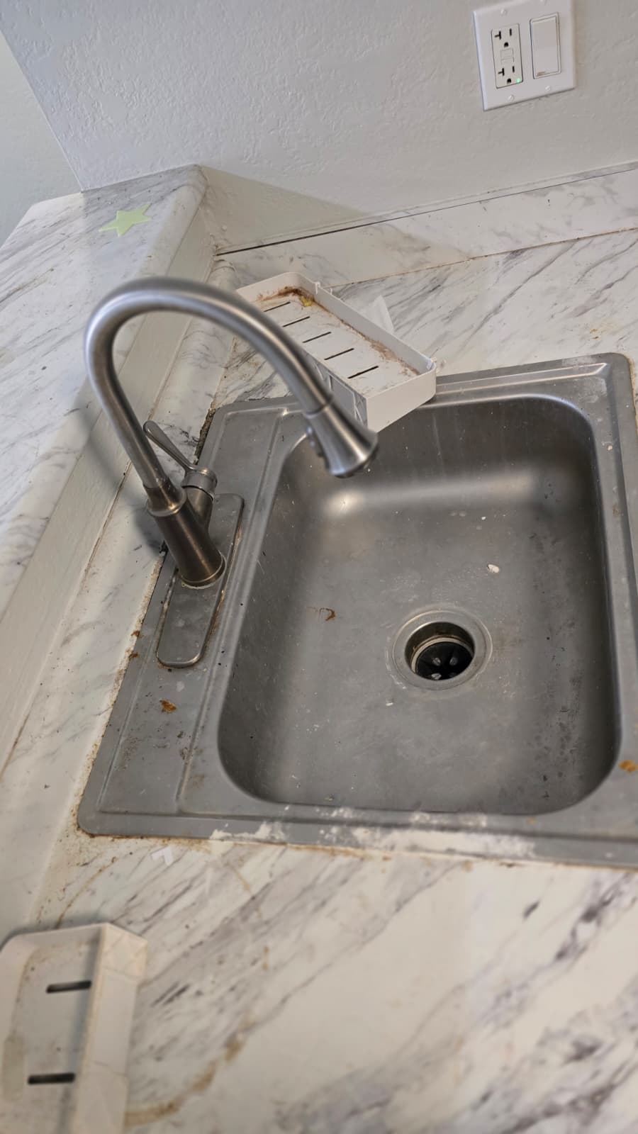 Kitchen sink — before cleaning